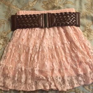 Pink ruffle skirt with brown belt